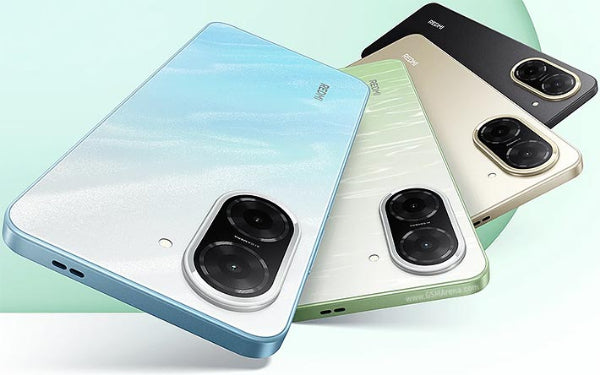 Four Redmi A5 smartphones in different colors on a light green background