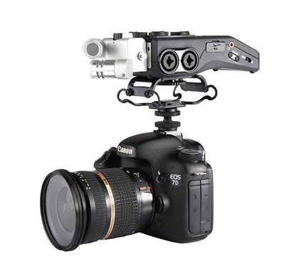 Canon EOS 7D camera with a BOYA BY-C10 Universal Microphone & Recorder Shock Mount attached on a white background