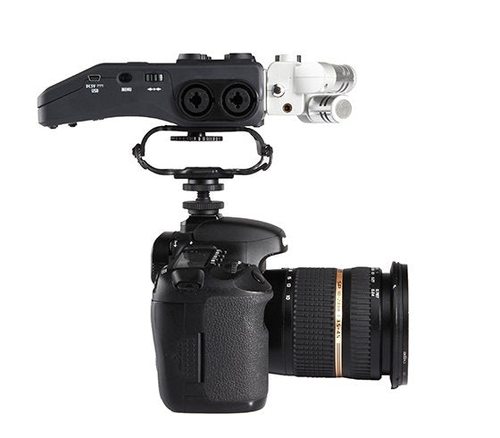Camera with a BOYA BY-C10 Universal Microphone & Recorder Shock Mount on a white background