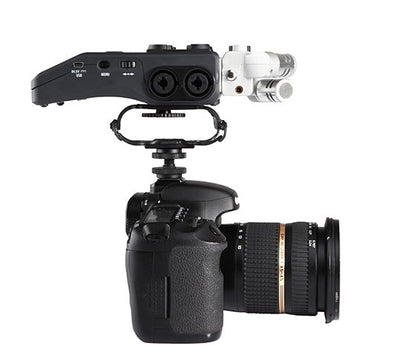 Camera with a BOYA BY-C10 Universal Microphone & Recorder Shock Mount on a white background