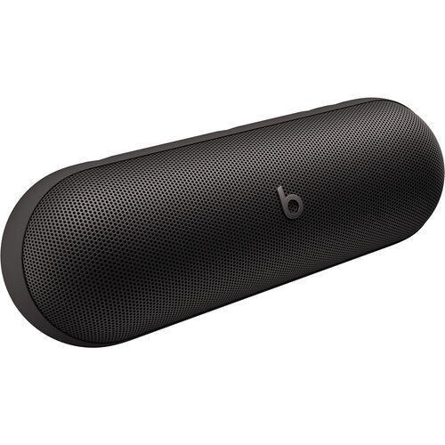 Black cylindrical speaker with Beats logo on a white background