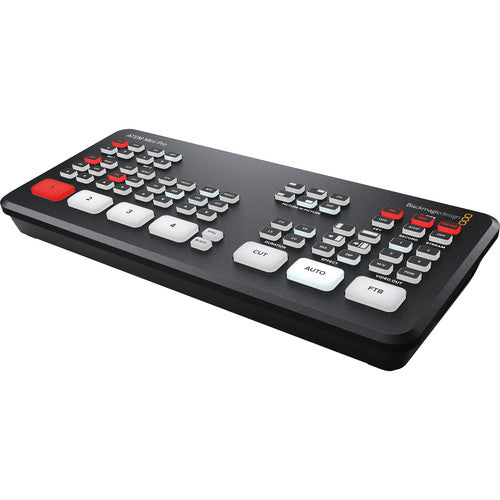Black video editing controller with buttons on a white background