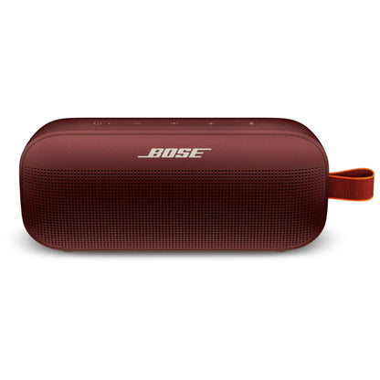 Red Bose portable speaker on a white background