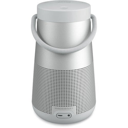 Silver portable speaker with a handle on a white background