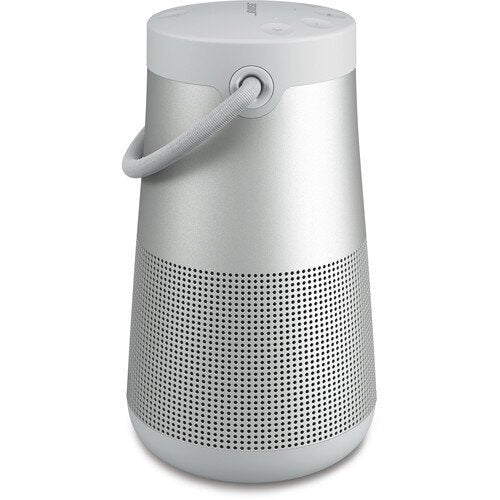 Portable speaker with a white top and silver body on a white background