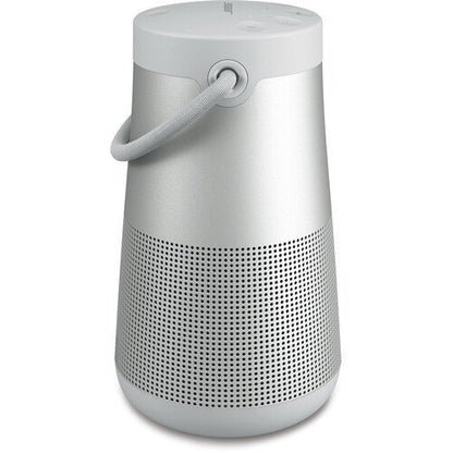Portable speaker with a white top and silver body on a white background