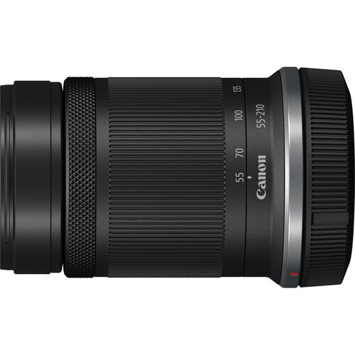 Canon EOS R100 Mirrorless Camera  55-210mm Lens on a white background
