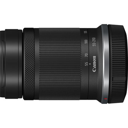Canon EOS R100 Mirrorless Camera  55-210mm Lens on a white background
