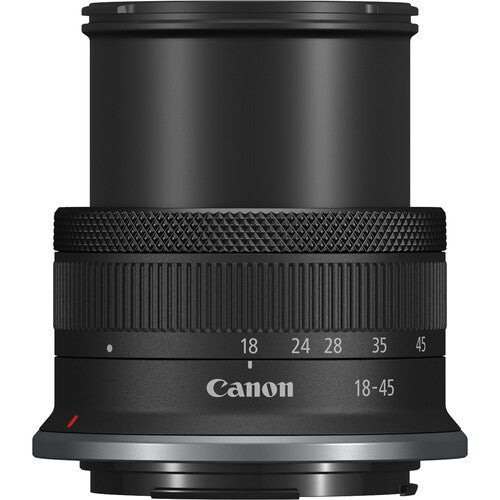 Canon EOS R100 Mirrorless Camera with 18-45mm on a white background