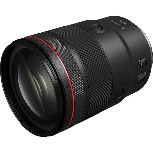 Camera lens with black and red design on a white background