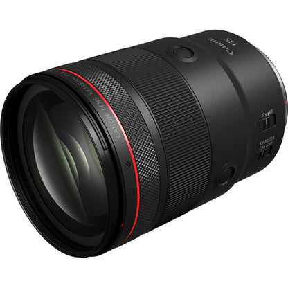 Camera lens with black and red design on a white background