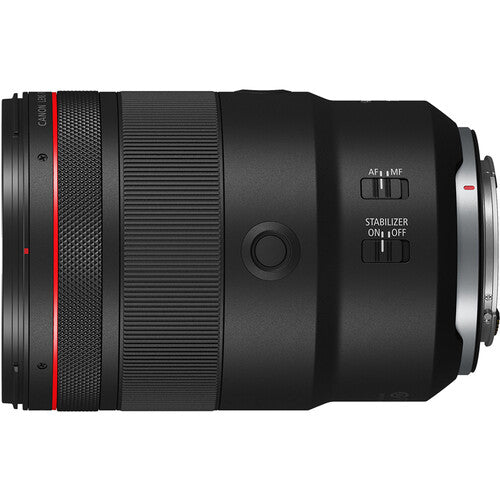 Camera lens with control buttons on a white background