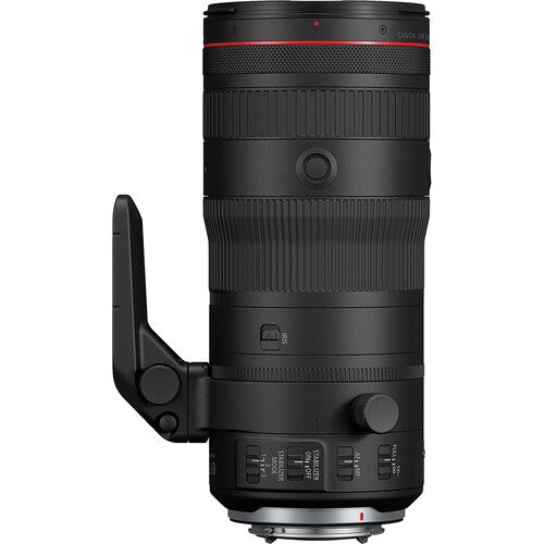 Camera lens with focus ring and control buttons on a white background