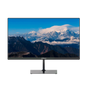 Monitor displaying a mountainous landscape with a blue sky