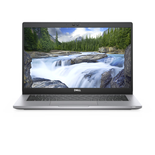 Laptop displaying a scenic wallpaper of a waterfall on a white background
