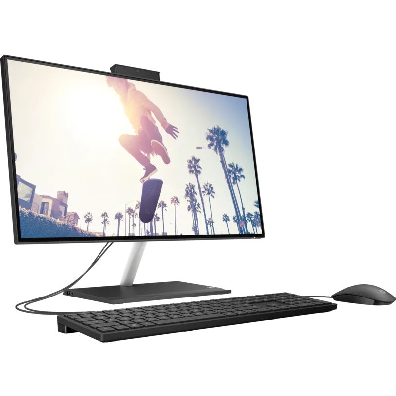 All-in-one computer with monitor, keyboard, and mouse on a white background