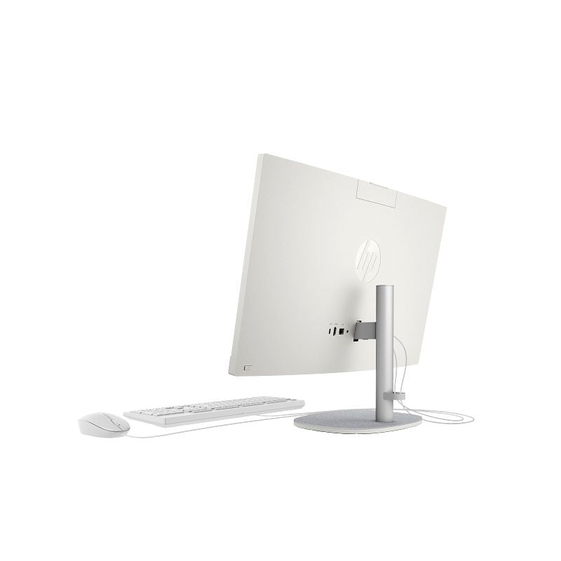 White computer monitor, keyboard, and mouse on a white background