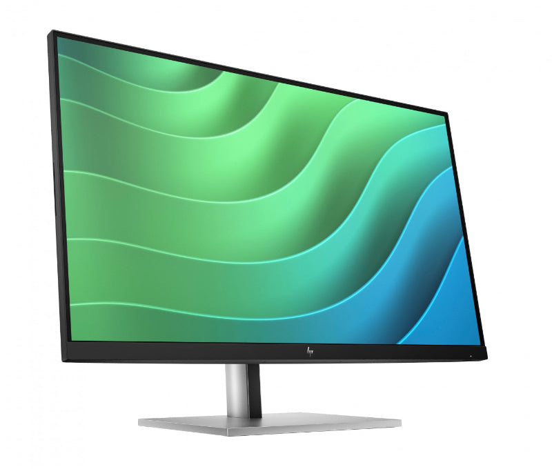 Computer monitor with a green and blue abstract design on the screen, on a white background