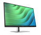 Computer monitor with a green and blue abstract design on the screen, on a white background