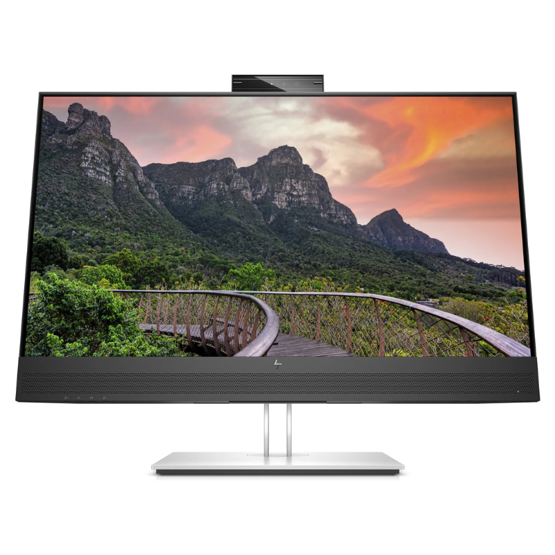 Monitor displaying a scenic view of mountains with a wooden walkway.