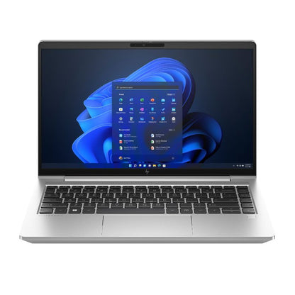 Laptop with a blue abstract wallpaper on a white background