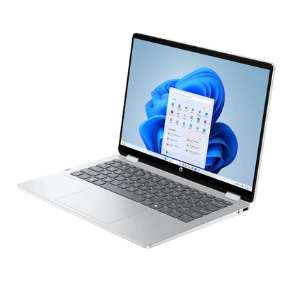 Laptop with a blue flower wallpaper on a white background