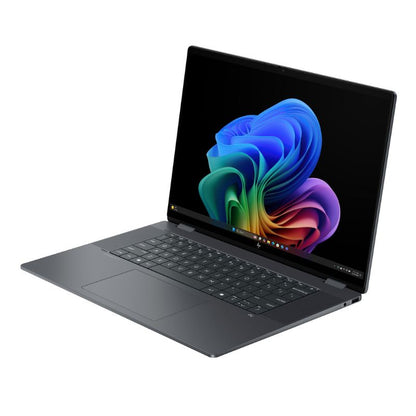 Laptop with a colorful abstract design on the screen against a white background