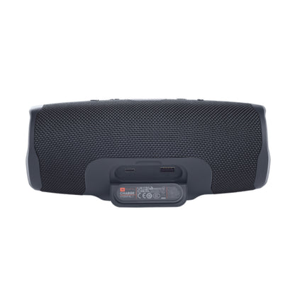 Black portable speaker on a white background
