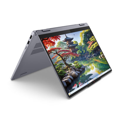 Laptop displaying a scenic image on its screen with 'intel' branding.