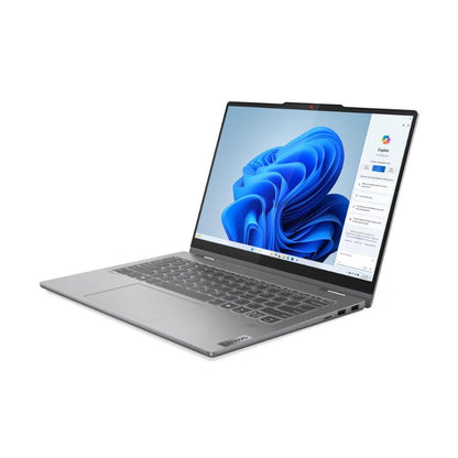 Laptop with a blue flower on the screen displayed on a white background