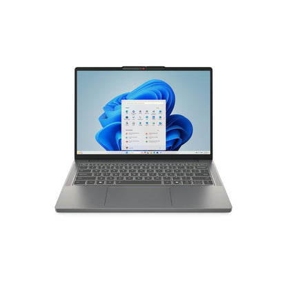 Laptop with a blue flower design on the screen against a white background