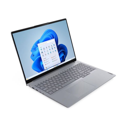 Laptop with a blue flower design on the screen against a white background