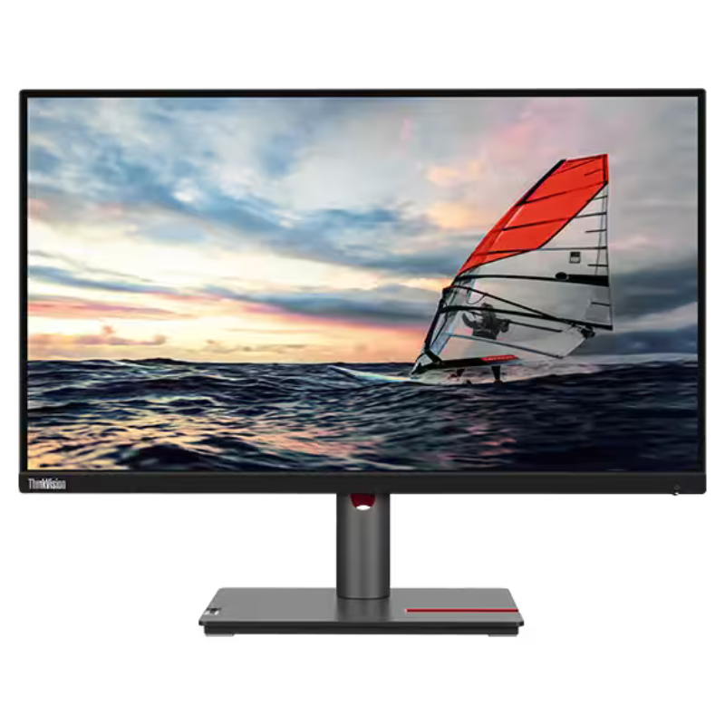 Monitor displaying a scenic image of a sailboat on water with a sunset.