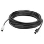 Coiled black cable with connectors on a white background