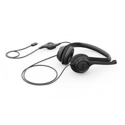 Black headphones with a microphone on a white background