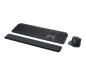 Black keyboard with wrist rest and mouse on a white background