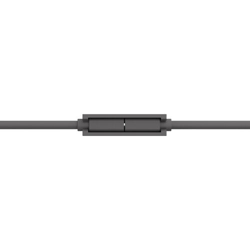 Close-up of a black metal cable connector on a white background