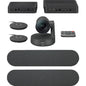 Logitech video conferencing system with camera, speakers, and remote control on a white background
