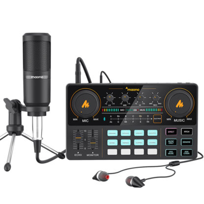 Microphone, audio interface, and earphones on a white background