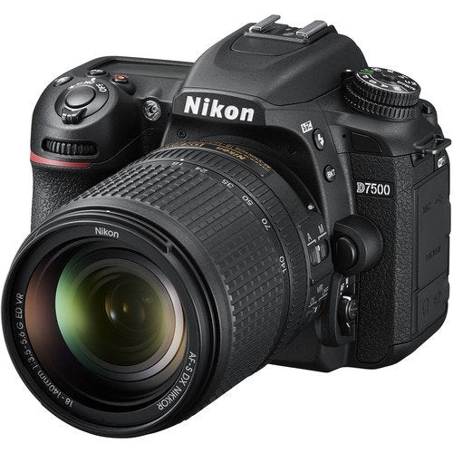 Nikon D7500 DSLR camera with lens on a white background