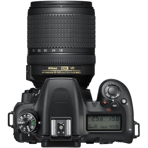 Nikon DSLR camera with lens on a white background