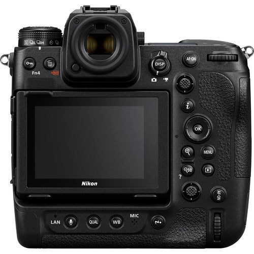 Back view of a Nikon camera with control buttons and screen on a white background