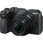 Black Nikon camera with Nikkor lens on a white background