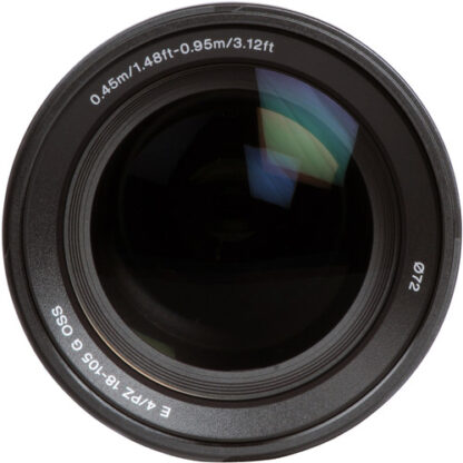 Close-up of a Sony E PZ 18-105mm f/4 G OSS Lens with text and reflective surface