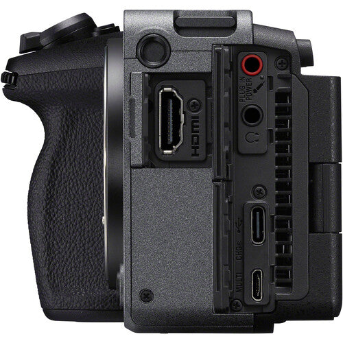 Close-up of a Sony FX30 Digital Cinema Camera body with various ports and controls on a white background